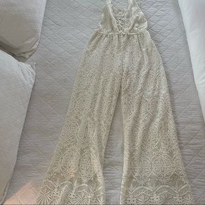 Lace Free people jumpsuit NEVER WORN.